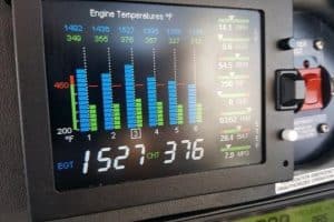 Aircraft engine instruments showing EGT and CHT temperatures
